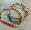 2mm Beaded Bracelet w/ Pattern of 3mm Orange Coral Beads